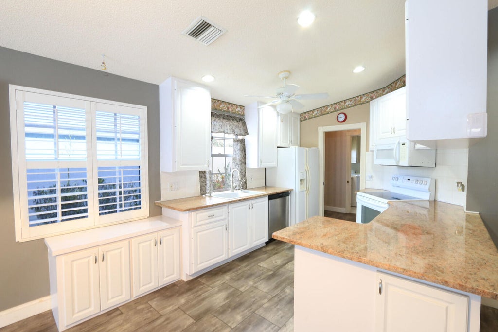 Photo of 1220 NW Bentley Circle #B, Port Saint Lucie, FL 34986 (MLS # B26013618)