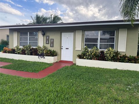 Photo of 4938 NW 54th Ct, Tamarac, FL 33319 (MLS # F10534659)