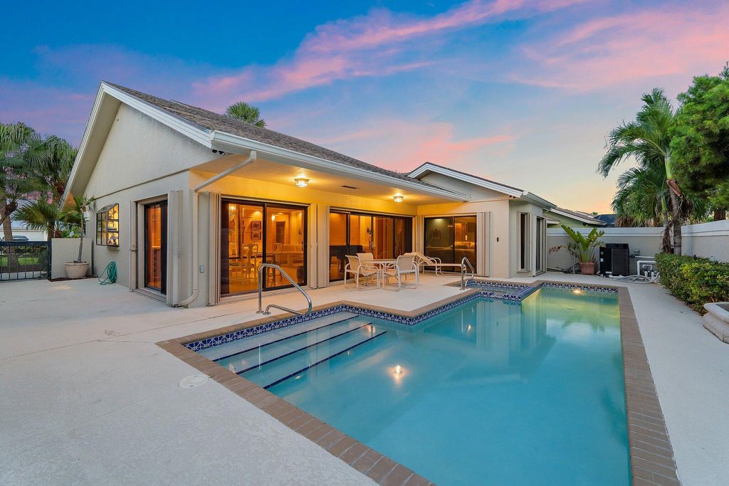 Photo of 104 Sand Pine Drive, Jupiter, FL 33477 (MLS # R11150737)