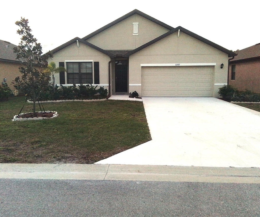Photo of 6289 NW Regent Street, Port Saint Lucie, FL 34983 (MLS # R10922334)