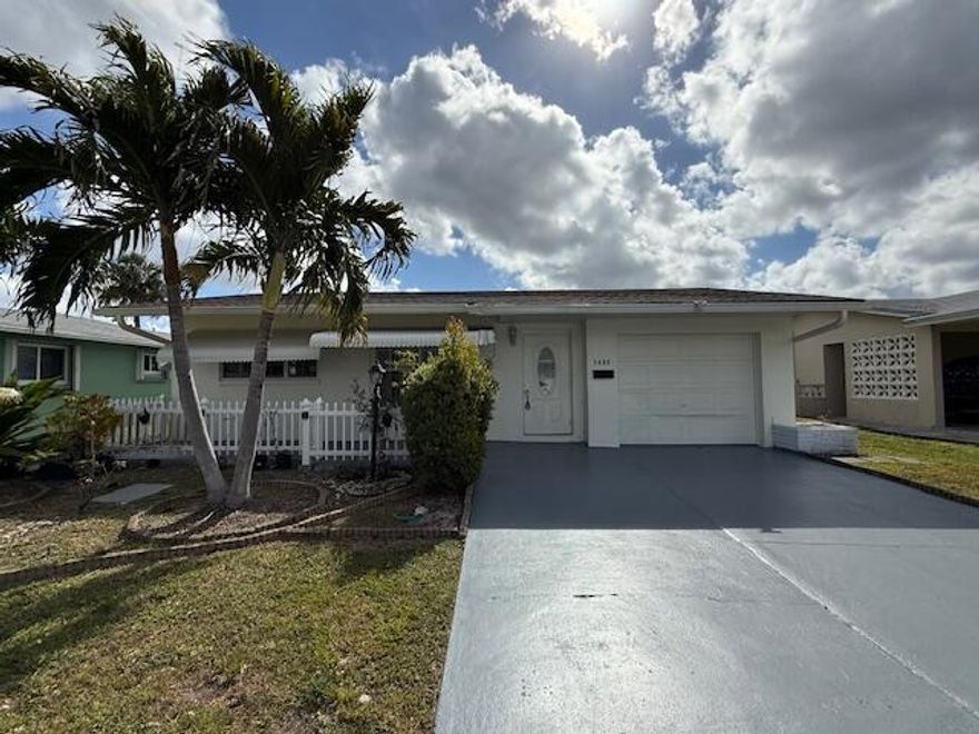 2 bedrooms 1 bathroom waterfront Home in desirable 55+ Community of Mainlands of Tamarac Lake. Porcelain floors throughout. Open kitchen with quartz countertops. Great garden and Canal views. Great location, quick and easy access to Turnpike. Come See Today!