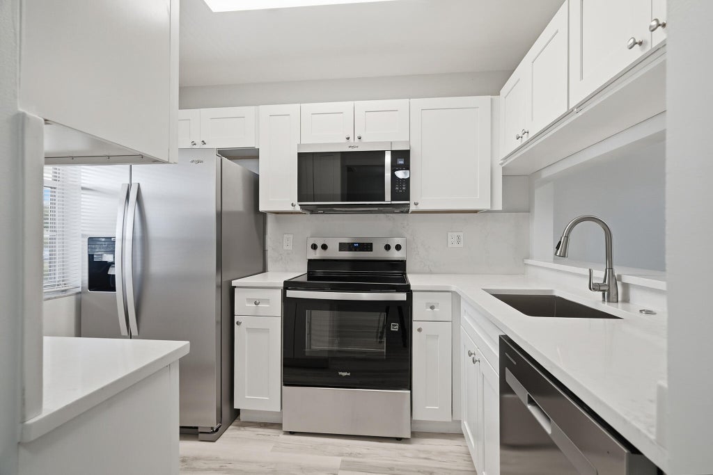 Photo of 9939 THREE LAKES Circle #14H, Boca Raton, FL 33428 (MLS # B26088789)