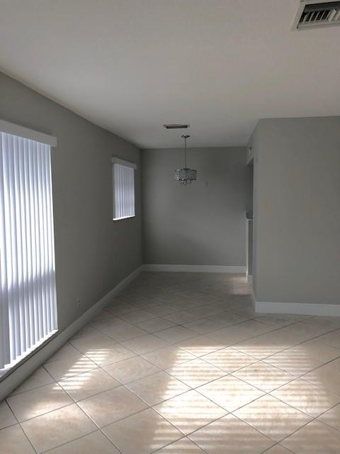 Great front apartment in Coral Ridge Country Club with large picture windows with lots of natural light. Apartment has central air, laundry facilities in building. This apartment was recently updated, and new kitchen appliances were just put in. There are laundry facilities on the premises. Must show steady and reliable source of income with a credit score of 650 or more. A nationwide background and credit check will be required.