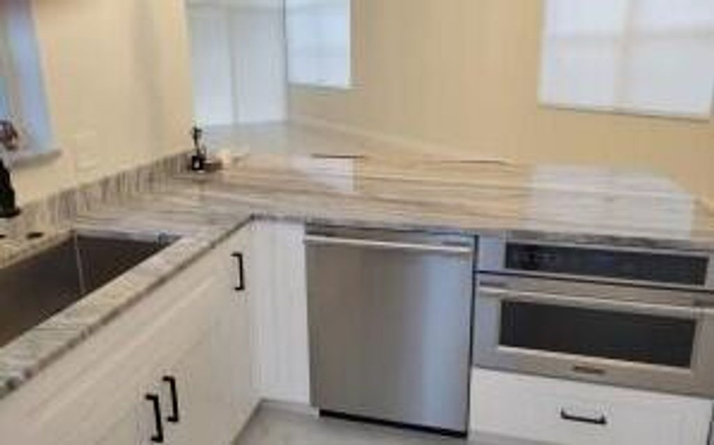 Photo of 6670 NW 25th Way, Boca Raton, FL 33496 (MLS # B26015301)