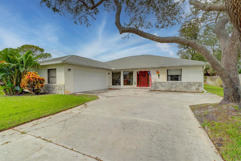 Photo of 2196 SE Dolphin Road, Port Saint Lucie, FL 34952 (MLS # R10938670)