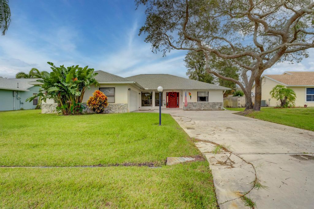 Photo of 2196 SE Dolphin Road, Port Saint Lucie, FL 34952 (MLS # R10938670)