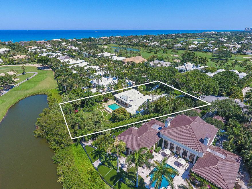 Nestled on one of the most desirable, over-sized golf course lots in Lost Tree, this premier location offers boundless opportunities. This four bedroom and four bathroom home has been artfully appointed with custom woodwork and trim; sliding glass doors open the kitchen out to a peaceful, zen garden and patio space. Boasting approximately .65 acre, the lot can accommodate a new home of approximately 8,000 square feet. Overlooking the 4th and 3rd holes, the quiet cul-de-sac of Palm Way offers endless privacy and a great opportunity to build your dream home.