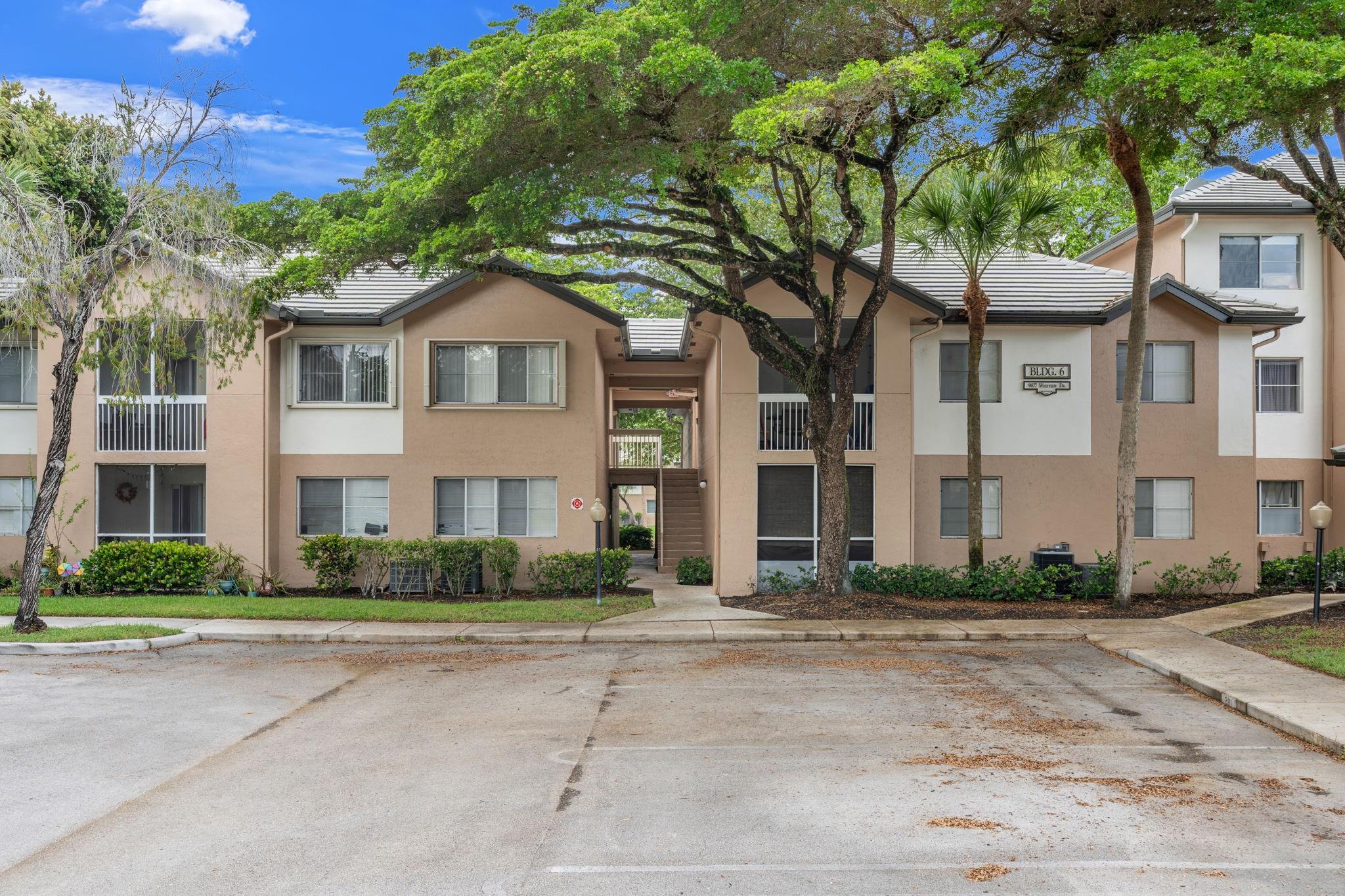 Updated 2/2 in Citation Way on the 1st Floor with Lake Views. Features Include Tile Flooring Throughout, a Walk-in Closet, and a Full-Size Washer/Dryer. Enjoy Scenic Lake Views from the Primary Bedroom and Screened-In Patio. Zoned for A Rated Schools, Including Stoneman Douglas. Prime Location Just Half a Mile from the Sawgrass Expressway On-Ramp, yet Peacefully Quiet (no traffic noise) and Steps Away from the Magnolia Shopping Plaza, Target & Walgreens. Amenities Include a Clubhouse, Pool, Tennis Courts & Fitness Center. Two Assigned Parking Spots. Vacant and Easy to Show.