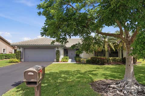 Photo of 12177 NW 1st Street, Coral Springs, FL 33071 (MLS # B26031769)