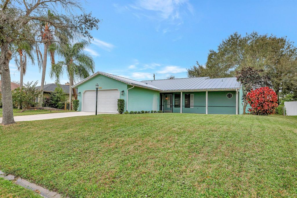 Photo of 2572 SW Mcdonald Street, Port Saint Lucie, FL 34953 (MLS # R10943729)