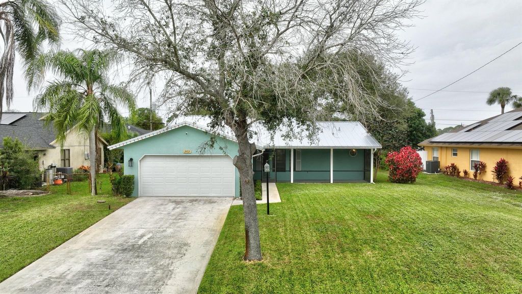 Photo of 2572 SW Mcdonald Street, Port Saint Lucie, FL 34953 (MLS # R10943729)