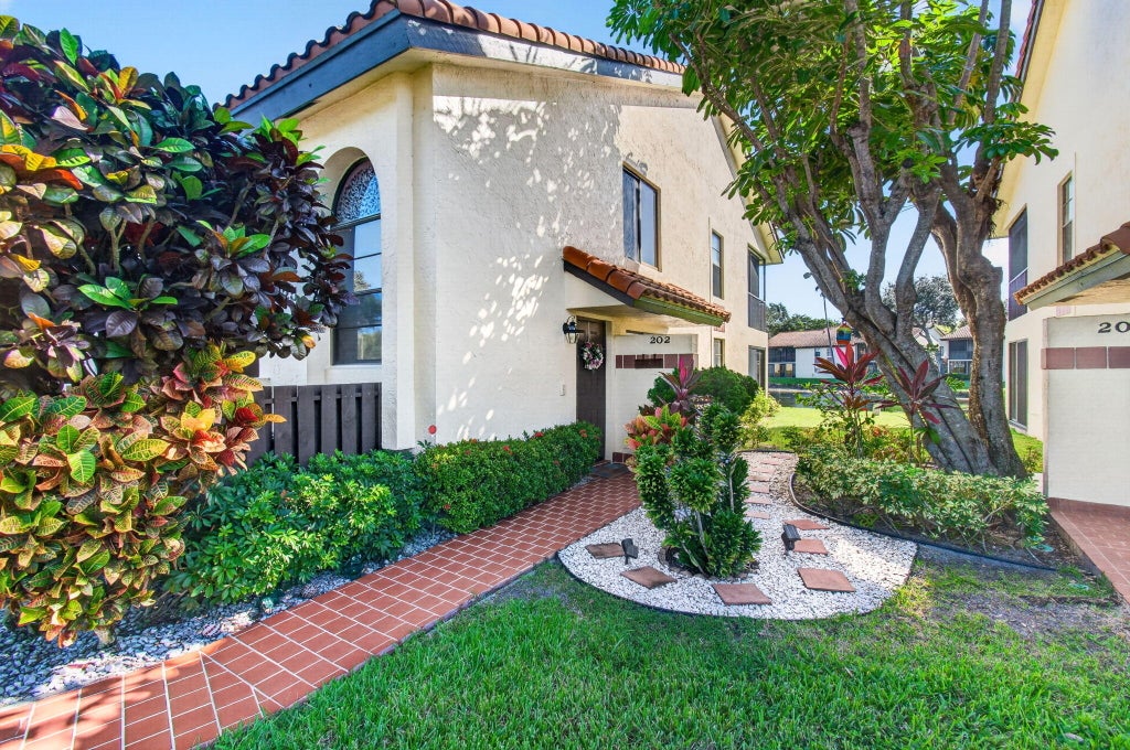 Photo of 10383 S Circle Lake Drive #202, Boynton Beach, FL 33437 (MLS # B26091393)