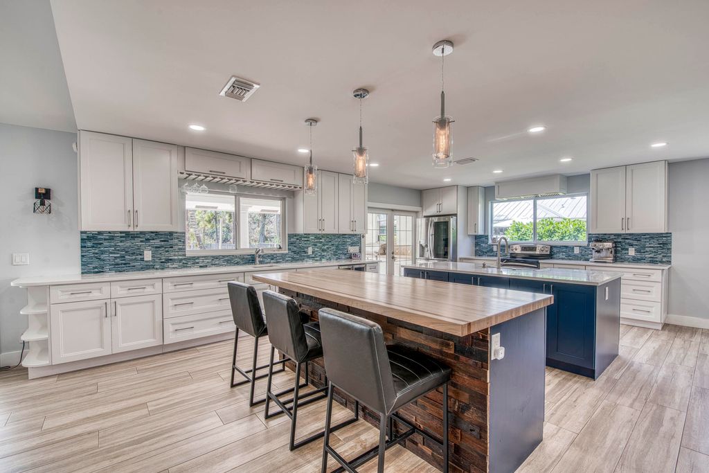 Photo of 6062 Woodlake Road, Jupiter, FL 33458 (MLS # R11169271)