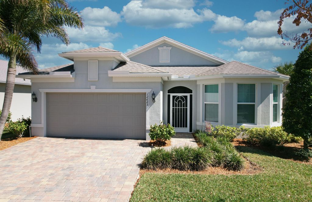 Photo of 12665 SW Cattleya Lane, Port Saint Lucie, FL 34987 (MLS # R11164765)