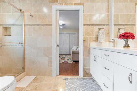 Tiny photo for 11999 Classic Drive, Coral Springs, FL 33071 (MLS # B26040062)