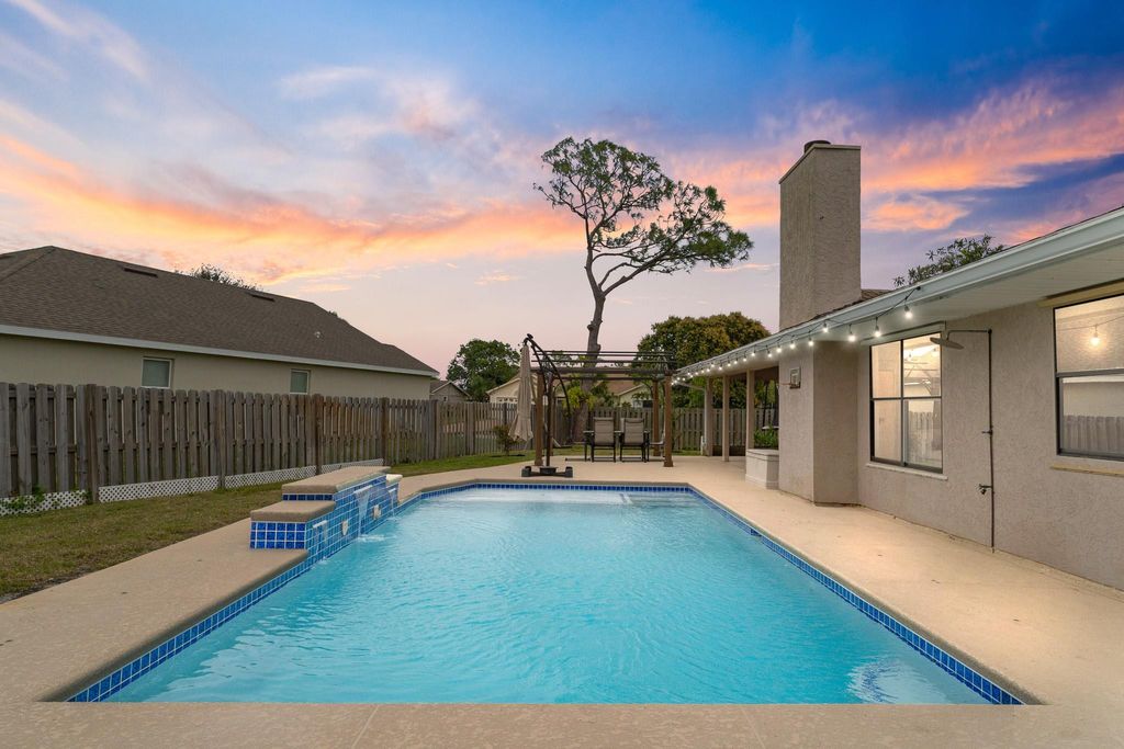 Photo of 365 SW Eyerly Avenue, Port Saint Lucie, FL 34983 (MLS # F10516858)