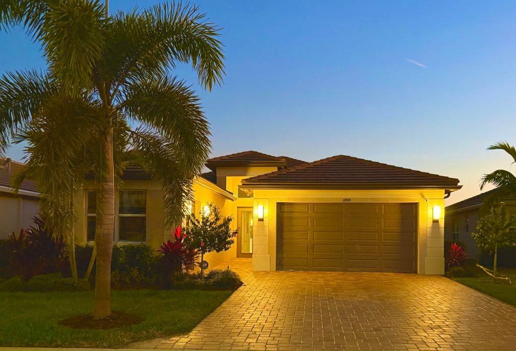 Photo of 11909 SW Coral Cove Parkway, Port Saint Lucie, FL 34987 (MLS # R11148975)