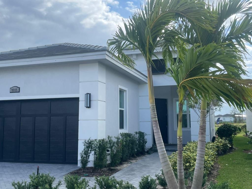 Photo of 9315 SW Pepoli Way, Port Saint Lucie, FL 34987 (MLS # R11055599)