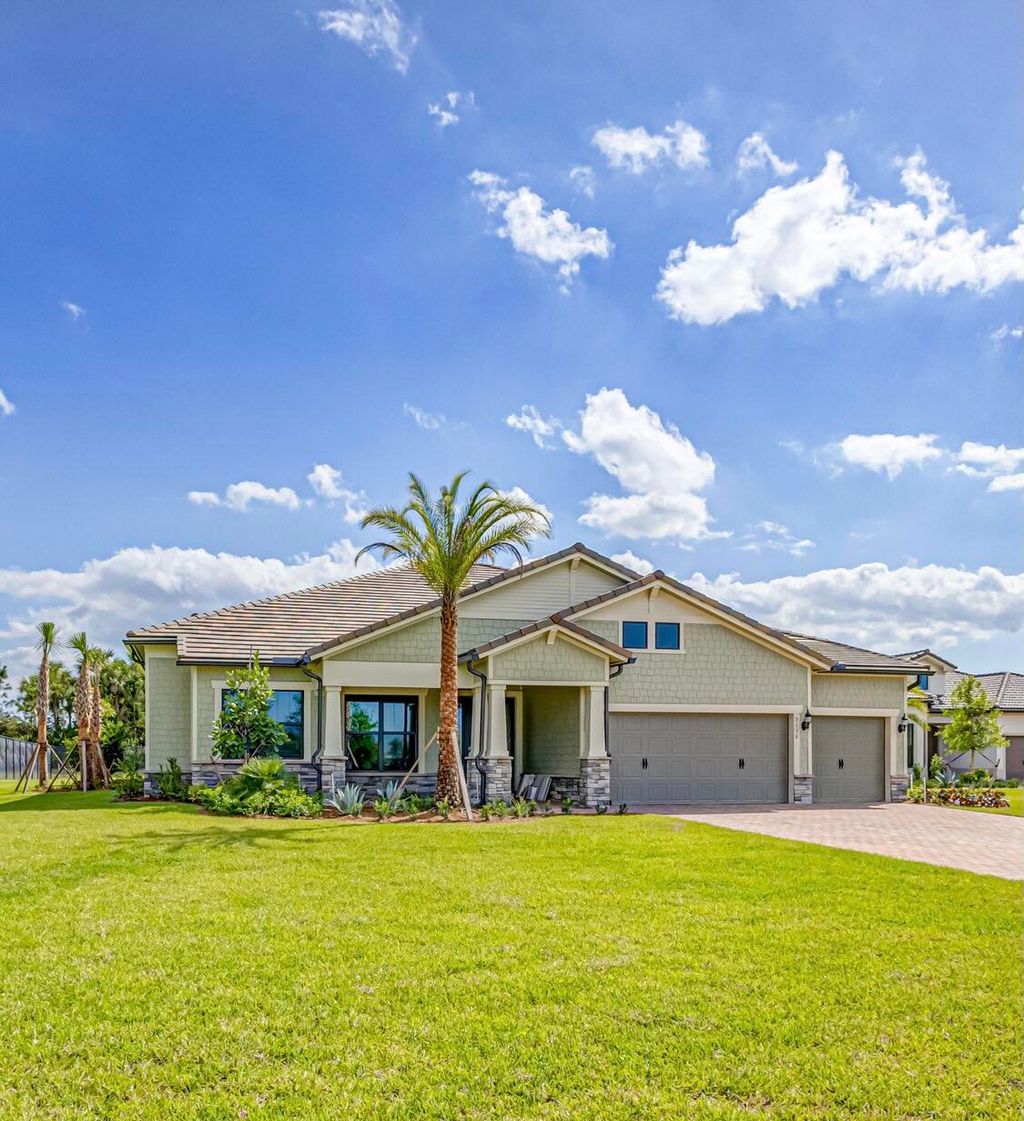 Photo of 9136 Balsamo Drive, Palm Beach Gardens, FL 33412 (MLS # R10876458)