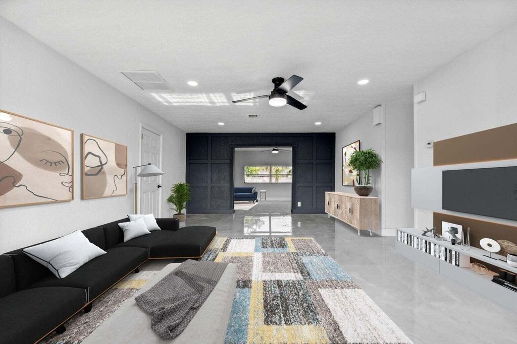 Photo of 815 W Jasmine Drive, Lake Park, FL 33403 (MLS # R10966186)