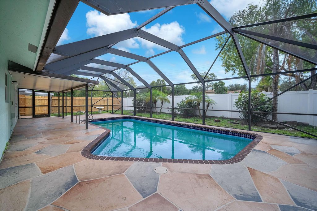 Photo of 3260 NW 63rd St, Fort Lauderdale, FL 33309 (MLS # F10536195)