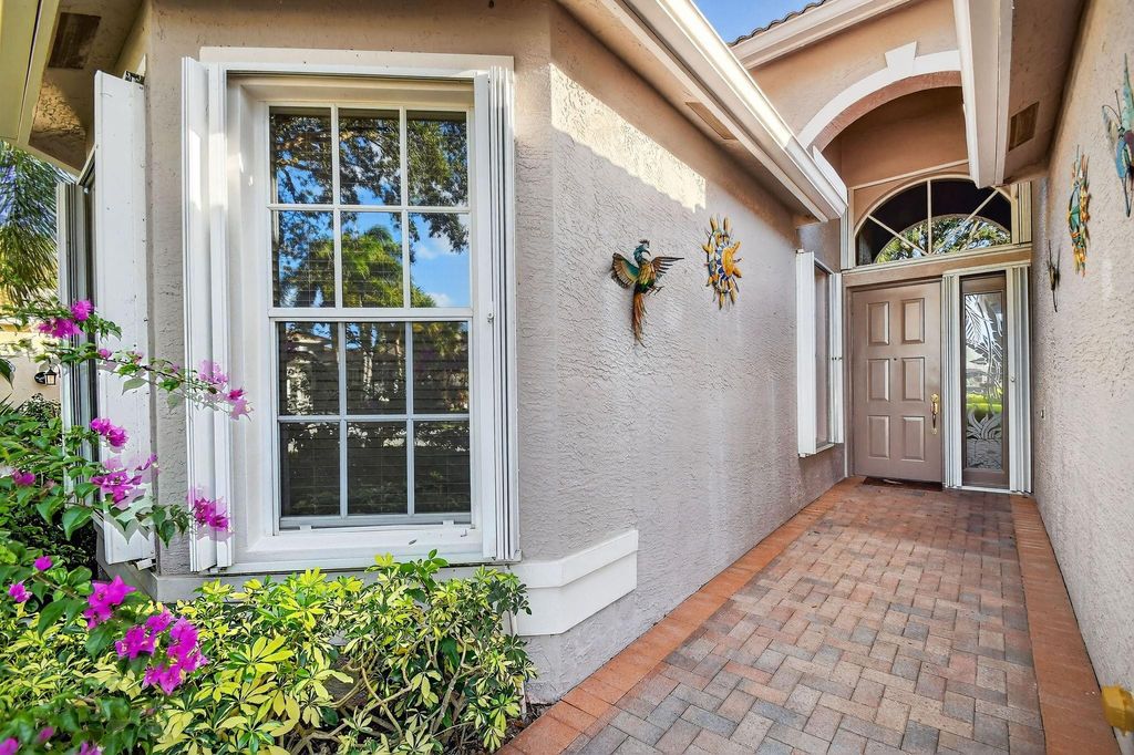 Photo of 8266 Sandpiper Glen Drive, Lake Worth, FL 33467 (MLS # F10540676)