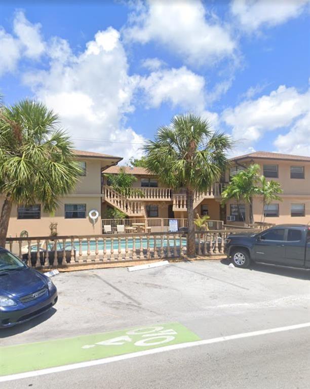 Move in with just the first month and security deposit. lovely one-bedroom apartment amazing location by Coral Ridge Mall, plenty of shopping and restaurants within walking distance and just a few minutes from Fort Lauderdale Beach. Nice tile floors throughout. shared laundry room. Nice community pool. The rent includes water and garbage. pet friendly. move in ready fast approval.