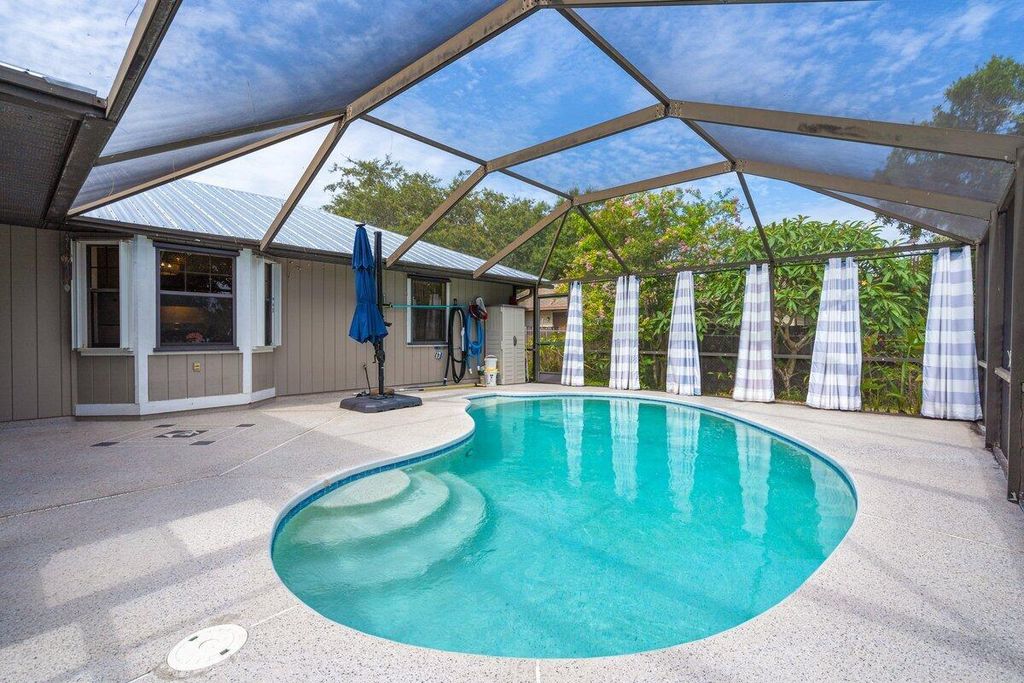 Photo of 6702 Penny Lane, Fort Pierce, FL 34951 (MLS # R11104013)