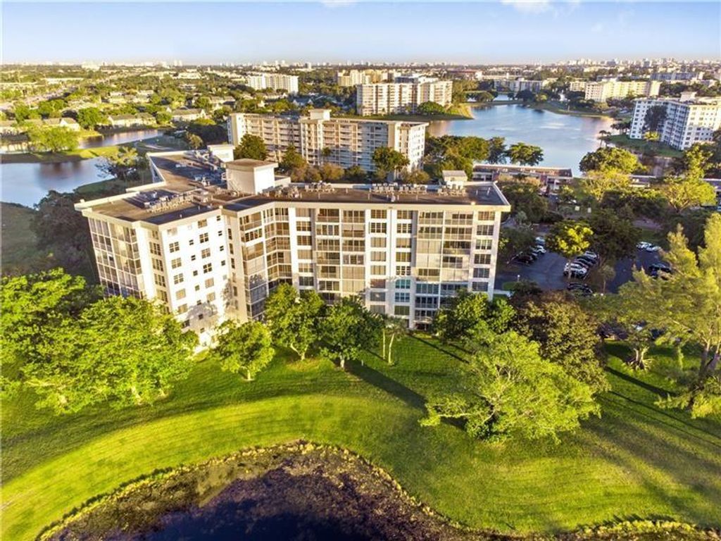 Photo of 3090 N Course Dr Dr #304, Pompano Beach, FL 33069 (MLS # F10338081)