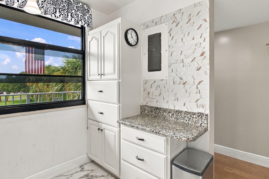 Photo of 1502 WHITEHALL Drive #305, Davie, FL 33324 (MLS # B26083287)