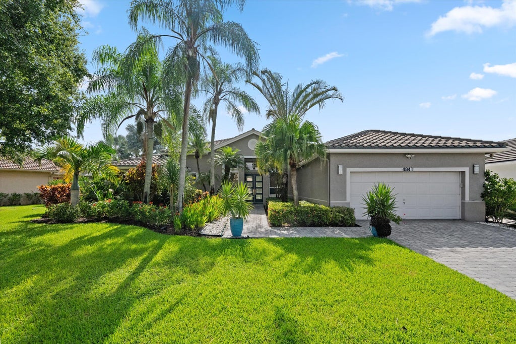 Photo of 4841 Exeter Estate Lane, Lake Worth, FL 33449 (MLS # B26077162)