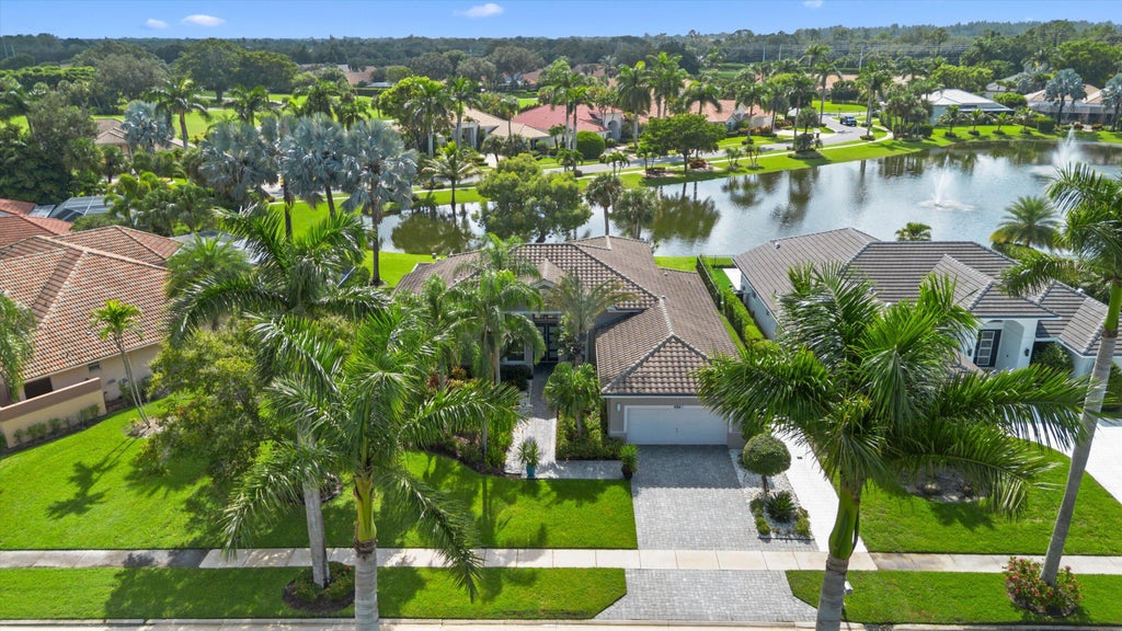 Photo of 4841 Exeter Estate Lane, Lake Worth, FL 33449 (MLS # B26077162)