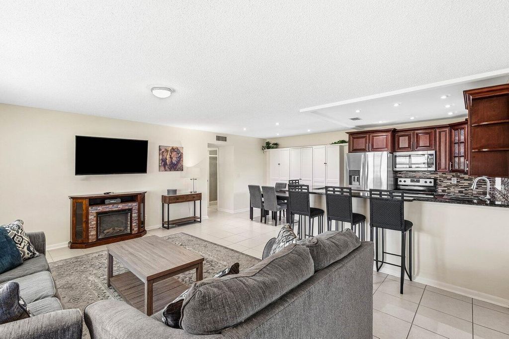 Photo of 4850 NW 4th Street #A, Delray Beach, FL 33445 (MLS # R11166401)