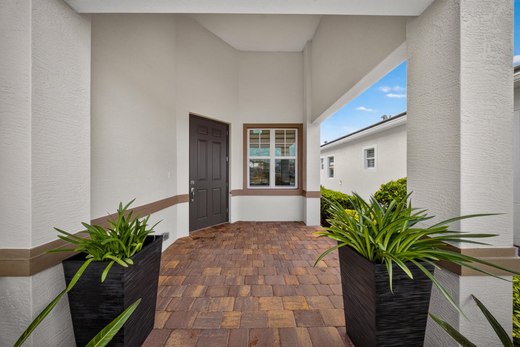 Photo of 25037 SW Alberti Way, Port Saint Lucie, FL 34986 (MLS # B26058402)