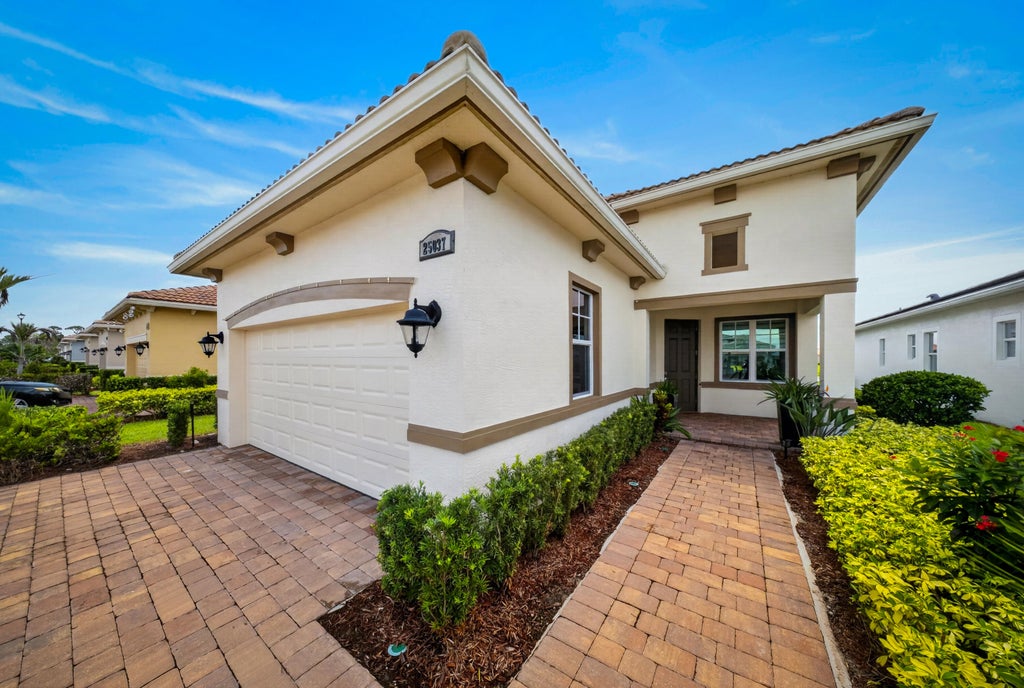 Photo of 25037 SW Alberti Way, Port Saint Lucie, FL 34986 (MLS # B26058402)