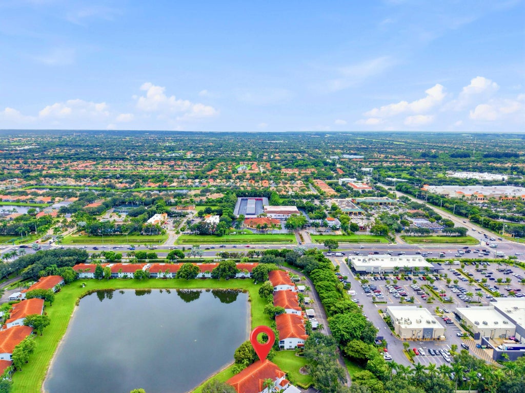 Photo of 7881 WHISPERING PALMS Drive #202, Boynton Beach, FL 33437 (MLS # B26074804)