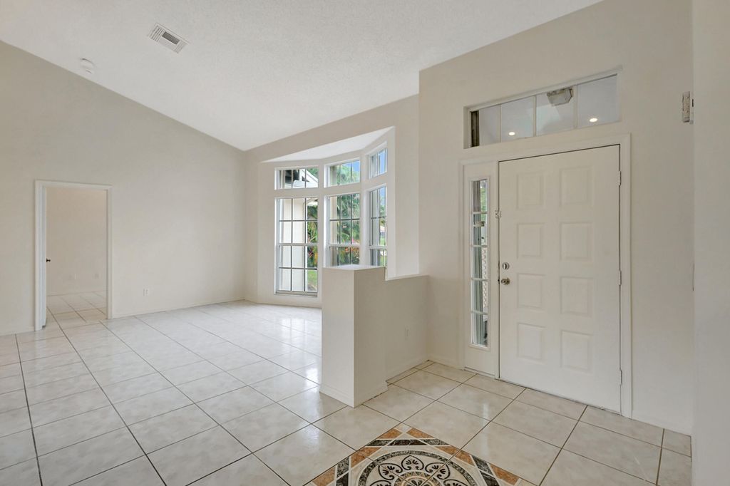 Photo of 1785 SE Berkshire Boulevard, Port Saint Lucie, FL 34952 (MLS # R10943885)
