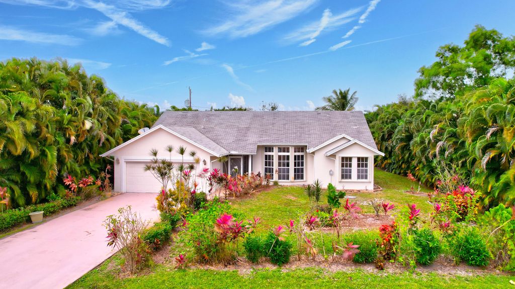 Photo of 1785 SE Berkshire Boulevard, Port Saint Lucie, FL 34952 (MLS # R10943885)