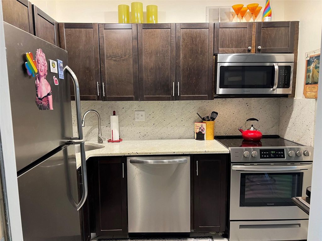 Photo of 1950 N Andrews Ave #103D, Wilton Manors, FL 33311 (MLS # F10542547)