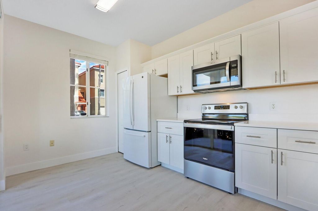 Photo of 11023 Legacy Lane #102, Palm Beach Gardens, FL 33410 (MLS # R11122419)