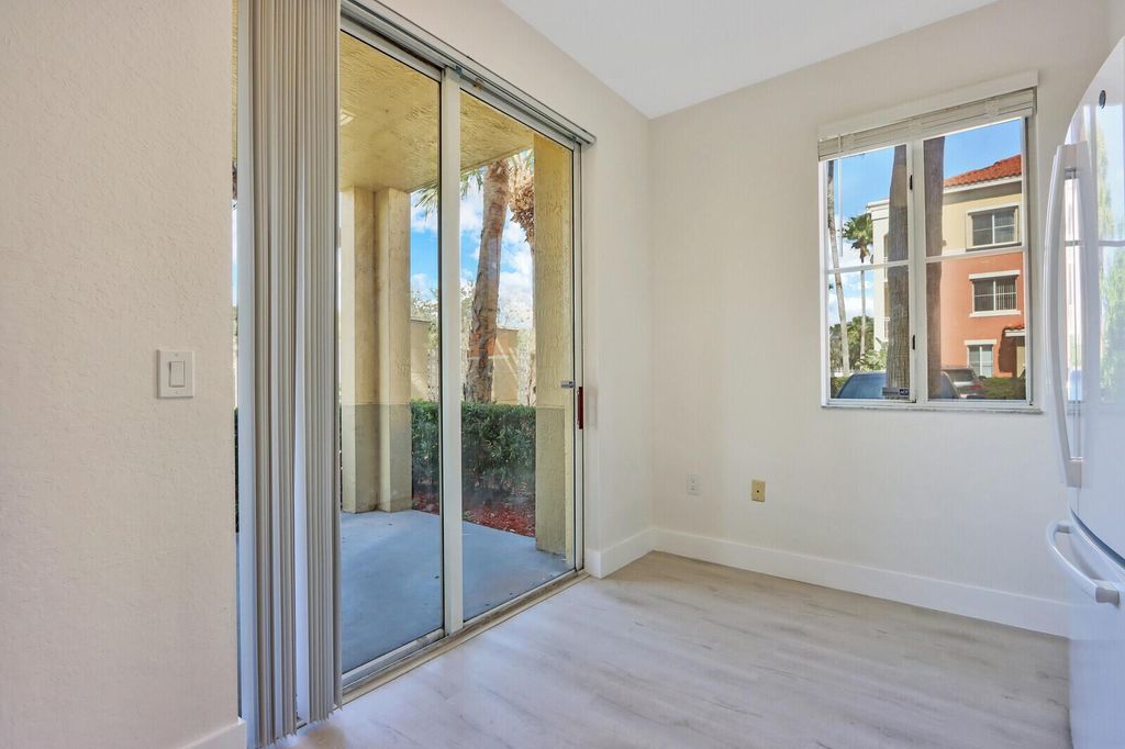 Photo of 11023 Legacy Lane #102, Palm Beach Gardens, FL 33410 (MLS # R11122419)