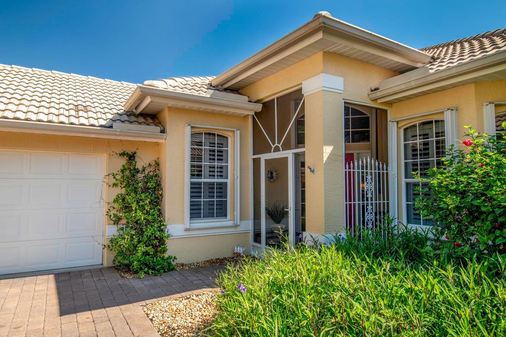 Photo of 4593 NW Red Maple Drive, Jensen Beach, FL 34957 (MLS # R10992372)