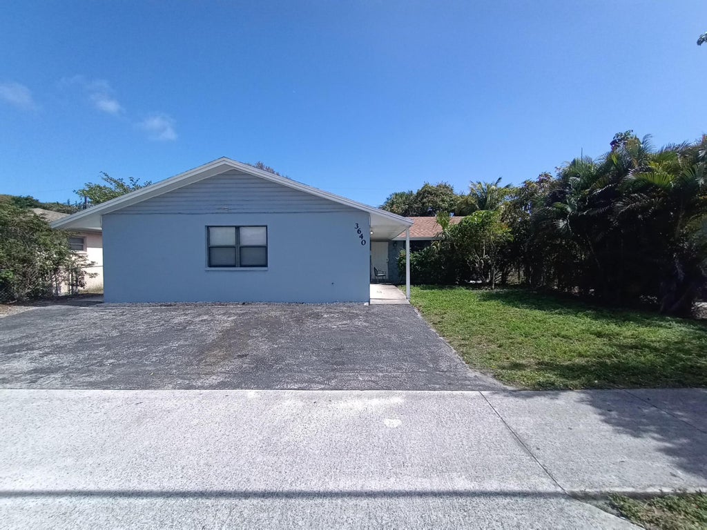 Photo of 3640 Avenue J, West Palm Beach, FL 33404 (MLS # B26057919)