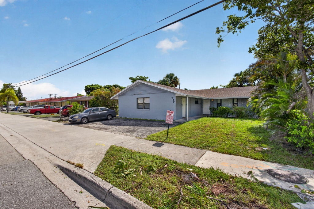 Photo of 3640 Avenue J, West Palm Beach, FL 33404 (MLS # B26057919)