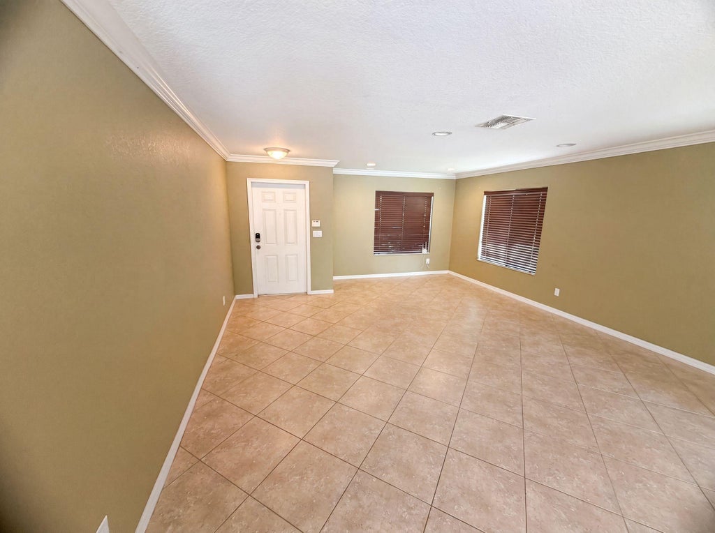 Photo of 2883 SW Cape Breton Drive, Port Saint Lucie, FL 34953 (MLS # B26066150)