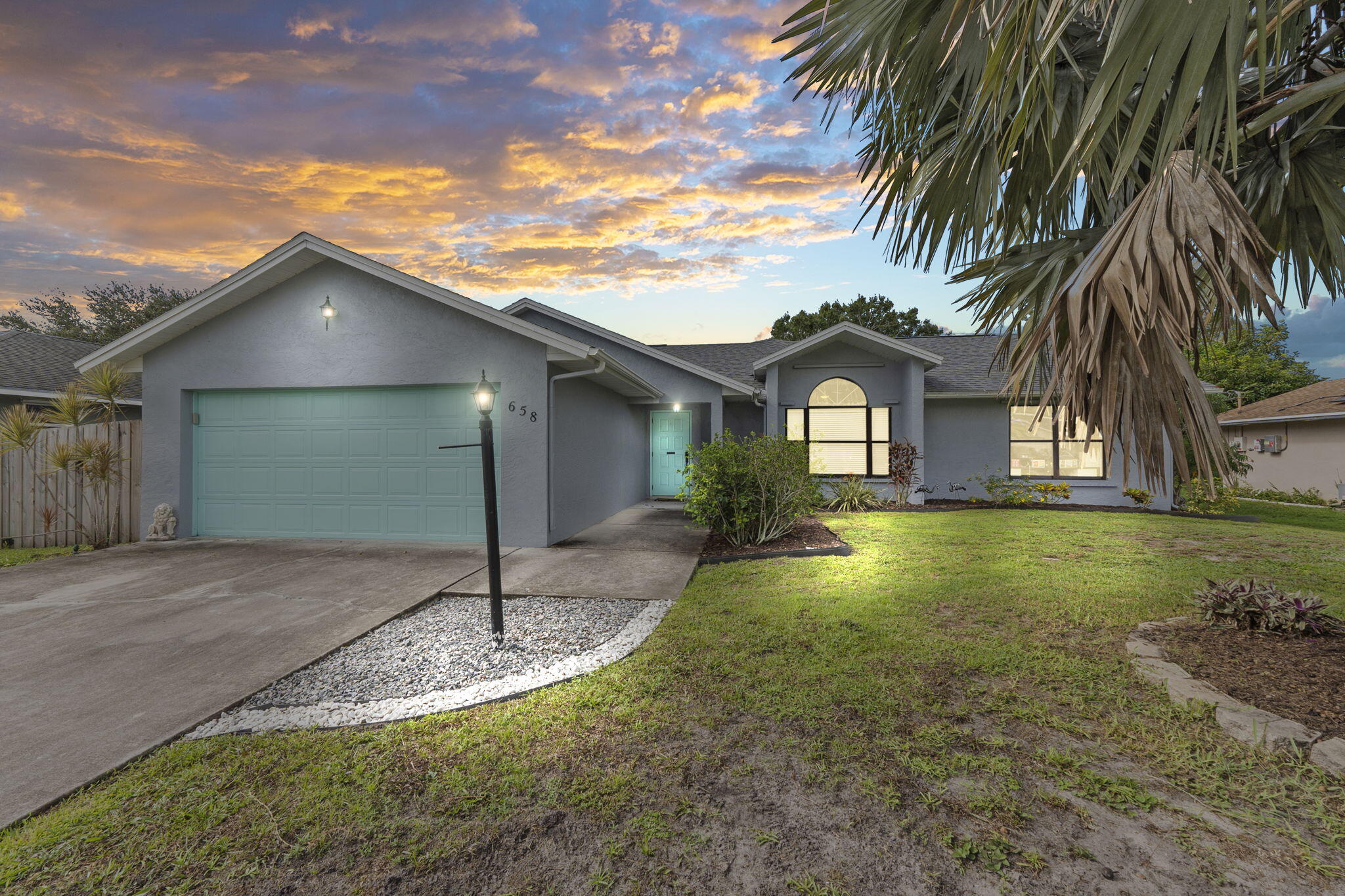 3 Bed, 2 Bath CBS Home with Vaulted Ceilings & Room to Entertain - No HOA!Welcome to this beautifully updated CBS home offering 3 spacious bedrooms and 2 full bathrooms, located in one of Port St. Lucie's most convenient areas. Enjoy peace of mind with a 2022 roof, 2018 hot water heater, and a new privacy fence installed in 2025.The home features vaulted ceilings and a bright, open layout with luxury vinyl plank flooring and tile throughout--no carpet! The kitchen boasts new stainless steel appliances, perfect for both daily use and hosting guests.Step through triple sliding glass doors to a large screened-in patio, complete with a doggy door, overlooking a fully fenced backyard with plenty of space for a pool--ideal for entertaining, kids, or pets.With no HOA and and a prime