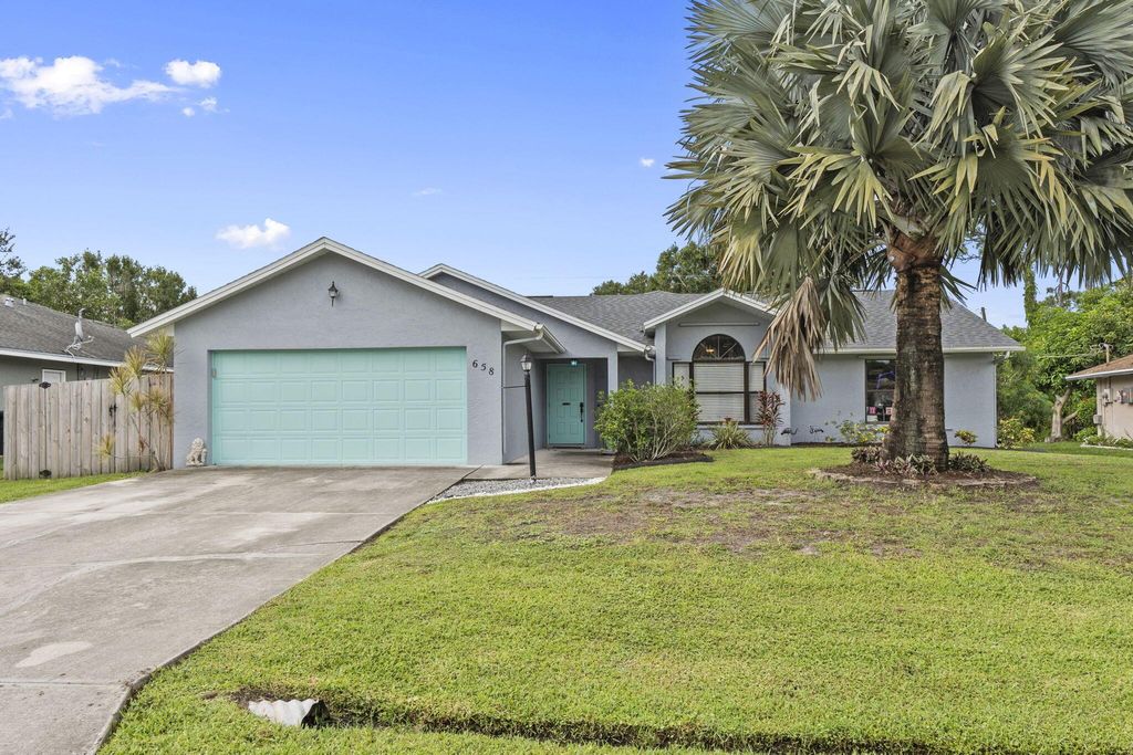Photo of 658 SE Strait Avenue, Port Saint Lucie, FL 34983 (MLS # R11109946)