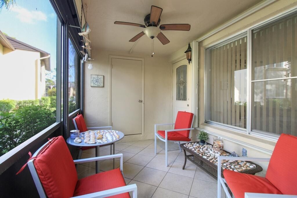 Photo of 407 Pine Glen Lane #C-1, Greenacres, FL 33463 (MLS # B26010610)