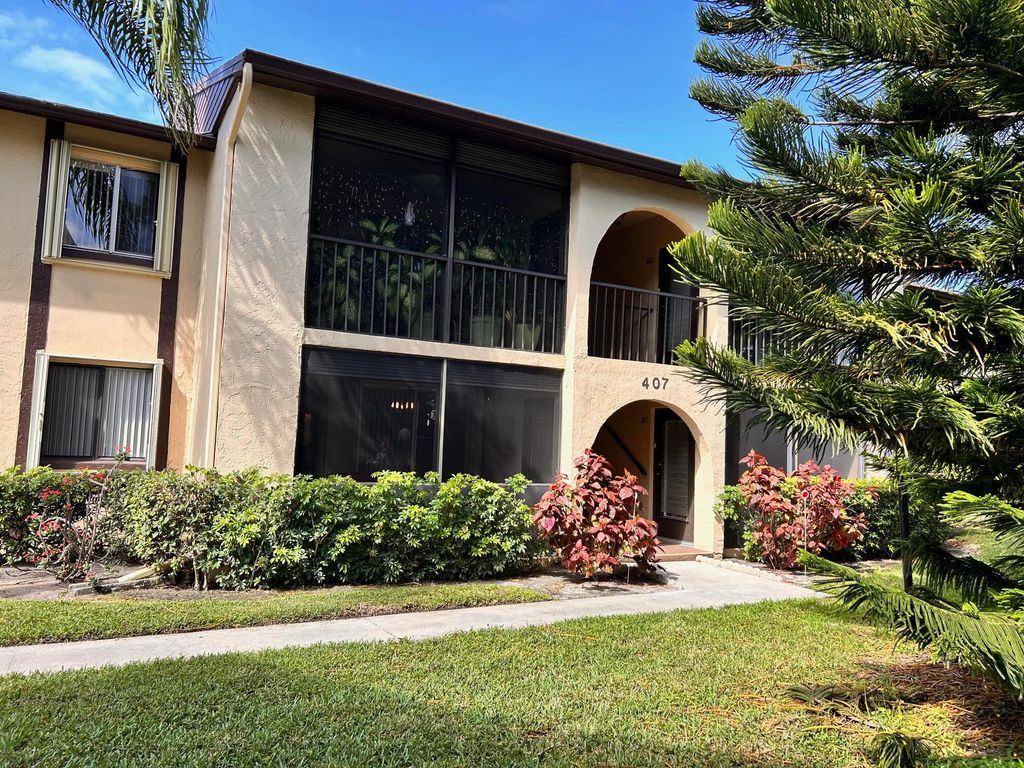 Photo of 407 Pine Glen Lane #C-1, Greenacres, FL 33463 (MLS # B26010610)