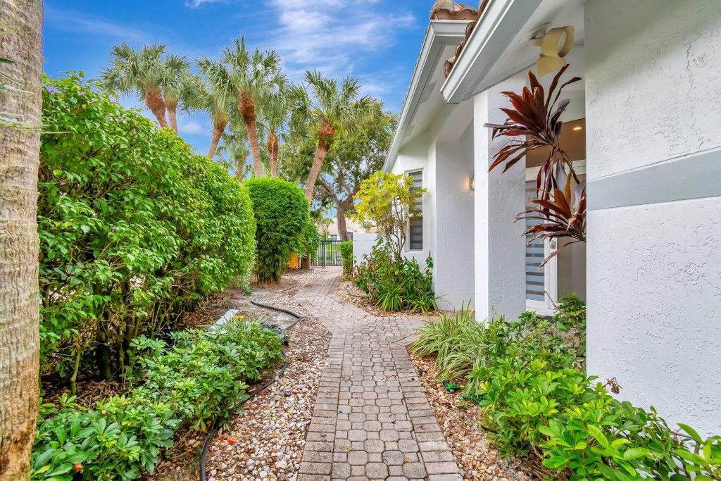 Photo of 2213 NW 62nd Drive, Boca Raton, FL 33496 (MLS # R11033091)